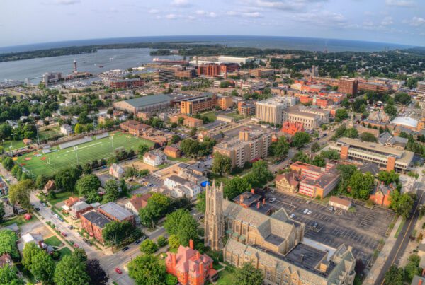 Erie, PA - Aerial View of Erie, PA With Many Buildings and Lake Erie