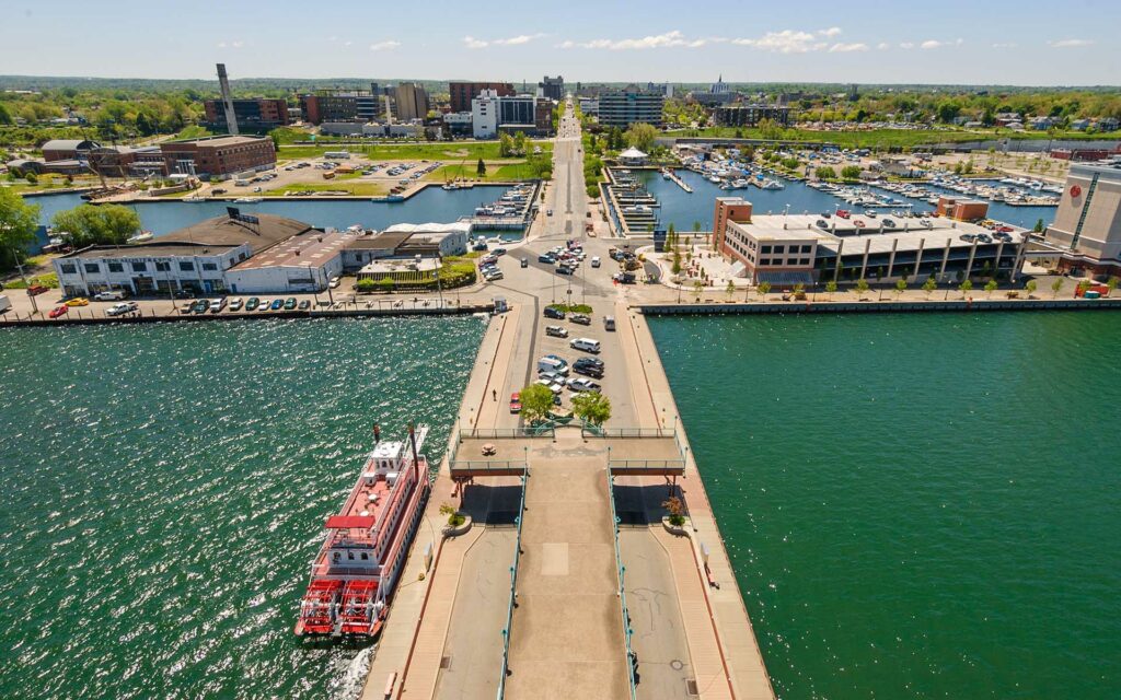 Homepage - Aerial View of Erie Skyline on a Sunny Day With Calm Water